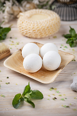 Image showing Fresh bath bombs on bamboo tray