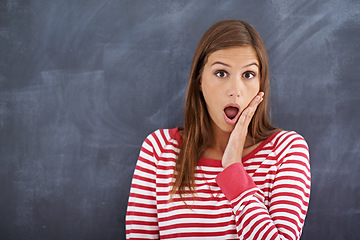 Image showing Woman, teacher and shock in portrait by blackboard, wow and what for announcement on curriculum. Female person, surprise and information in classroom, knowledge and mind blown for lesson plan at work