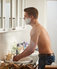 Image showing Man, foam for shaving and grooming in bathroom, skincare and beauty with morning routine at sink. Skin health, cosmetic cream or soap for hygiene, dermatology and hair removal with facial at home