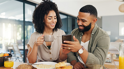 Image showing Couple, happy and coffee with smartphone for social media, sharing music or app explanation. Man, woman and technology in kitchen with breakfast for morning, relaxing and scrolling on online website