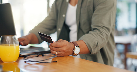 Image showing Man, credit card and laptop at desk for successful online shopping, gambling or subscription at home. Male person, technology and hands gesture for ecommerce, booking or payment for traveling