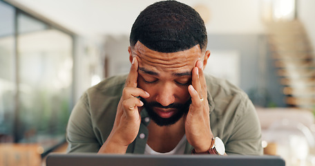 Image showing Remote work from home, man and laptop with headache, burnout and tired with a deadline and anxiety. Pain, freelancer and entrepreneur with computer, migraine and stress with startup debt and fatigue