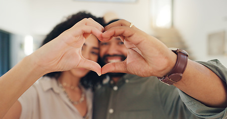 Image showing Man, woman and portrait with heart hands for valentines day with smile, care and marriage in home. Happy couple, celebration and emoji for love, romance and commitment to relationship in apartment.