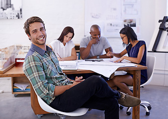 Image showing Happy man, creative and portrait with team for meeting, planning or architectural design at office. Employee or architect with smile, documents or paperwork in group project or startup at workplace