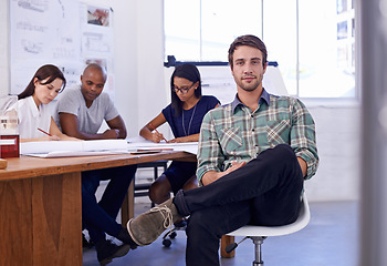 Image showing Happy man, creative and portrait with team for startup, meeting or planning of architectural design at office. Employee or architect with smile, documents or paperwork in group project at workplace