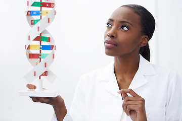 Image showing Science, woman and dna model in laboratory with molecule genetics, biological diagnostics and organism development. Scientist, african professional and thinking of helix particles for medical study
