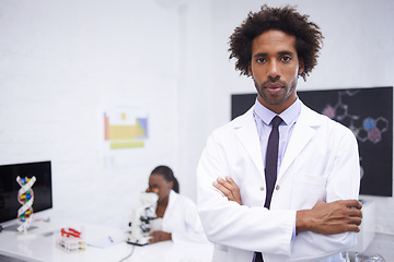 Image showing Scientist, portrait and arms crossed with confidence in laboratory for chemical research, medical study and serious. Science, african collaboration and face with pride for pharmaceutical experiment