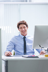 Image showing Man, office and portrait with pc and desk, happy and confident corporate male person sitting in workspace. Technology, digital search administrator and smile, browse internet on business computer