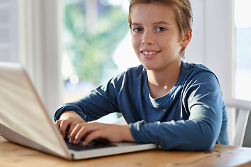 Image showing Home, boy and kid with laptop in smile for online learning with child development, growth and study. Homework, internet and research with notes for assignment or school project, deadline and happy