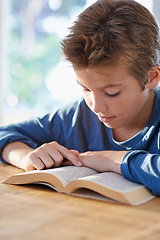 Image showing Home, boy and kid with textbook to study or read with learning for child development, knowledge and growth Closeup, homework and information for education with notes for exam, test and school project