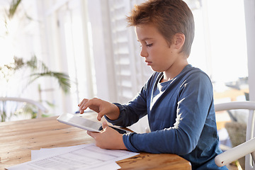Image showing Home, boy and paper with tablet for education on online learning for revision, study and child development. Homework, internet and research with information for assignment and school project.