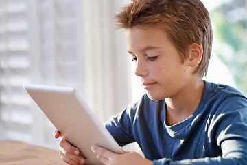 Image showing Home, boy and tablet for education with online learning for child development, growth and study. Homework, internet and research with information for assignment or school project and deadline.