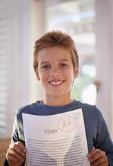Image showing Child, portrait and paper exam for education learning or student essay in home or scholarship, goals or academic. Male person, face and document pride or primary school studying, results or knowledge