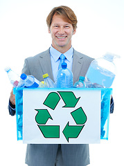 Image showing Happy businessman, portrait and box with recycle plastic for eco friendly environment on a white studio background. Man or employee with bucket of trash, garbage or bottles for pollution or earth day