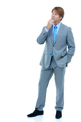 Image showing Businessman, thinking and fashion with suit for idea, choice or decision on a white studio background. Man or employee in wonder or thought for selection, opinion or business solution on mockup space