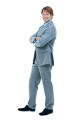 Image showing Businessman, portrait or smile with arms crossed in studio or confident in career by white background. Director, face and positive for commitment to job satisfaction and professional in suit or tie