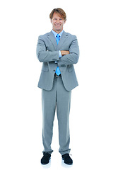 Image showing Businessman, portrait or happy with arms crossed in studio or confident in career by white background. Executive, positive face and accountant for commitment to job and satisfaction as professional