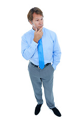 Image showing Businessman, thinking and doubt with fashion suit for idea, choice or decision on a white studio background. Man or employee in wonder or thought for selection, opinion or business solution on mockup