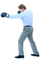Image showing Businessman, punch and boxing gloves in studio for competition, corporate opportunity and victory at work. Male person, pride and confidence to fight for promotion on white background with smile