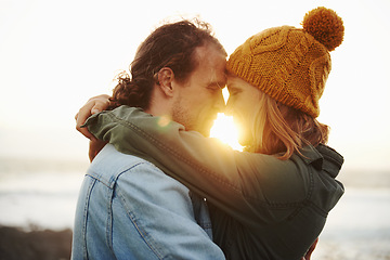 Image showing Hug, outdoor and couple with love, sunshine and lens flare with holiday for embrace or honeymoon. Romance, relationship or man with woman or happiness with vacation or journey with journey or date