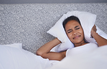 Image showing Bed, pillow and woman frustrated by insomnia, anxiety or sleep issue at home. Bedroom, noise and lazy female person in a house angry with morning, fatigue or overthinking sleeping, mistake or fail