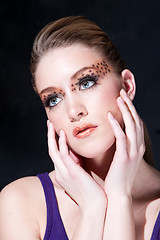 Image showing Beatiful face with Leopard print eyes