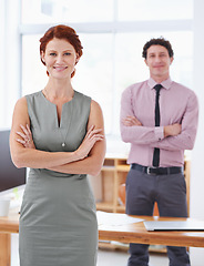 Image showing Portrait, confident and businesswoman with smile in office, professional and corporate in workplace. Female person, pride and happy with colleague for business deal or startup project for future