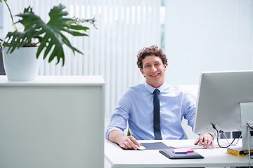 Image showing Businessman, office and portrait with corporate technology and desk, happy and confident male person sitting. Workspace, digital search and administrator with smile, browse internet on business pc