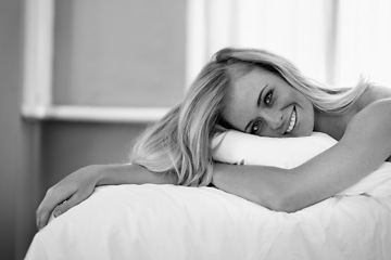 Image showing Portrait, smile and woman in bed in home to relax or wake up in the morning in apartment in Sweden. Face, happy and young person in bedroom for resting, comfort or lying on black and white sheets