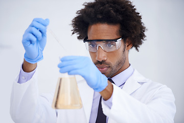 Image showing Man, pipette and flask for science in laboratory, experiment and liquid for biochemistry in container. Black male person, doctor and research for breakthrough, solution and process for medical study