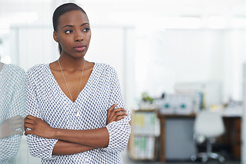 Image showing Thinking, problem solving and business black woman arms crossed in office for start of future with space. Agency, idea and planning with young employee in design workplace for creative career