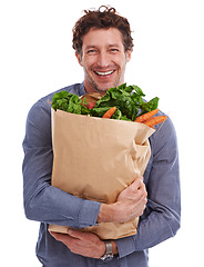 Image showing Studio, smile or portrait of man with groceries on promotion, sale or discounts deal for nutrition. Happy, delivery offer and male person with healthy food for cooking, organic fruits or diet choice