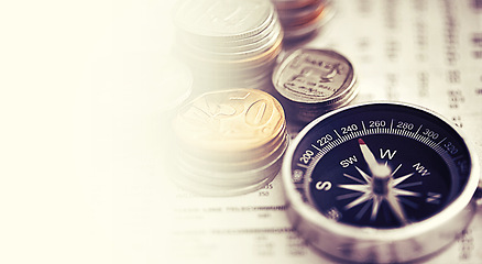 Image showing Coins, compass and business of newspaper for exchange rate, interest and direction on stock market for investor. Information, money and illustration of forex trading and financial indicators on paper