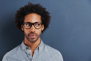 Image showing Thinking, doubt and man with glasses on studio mockup for planning, questions or asking on blue background. Why, curious and African male model with guess, forgot and problem solving or solution