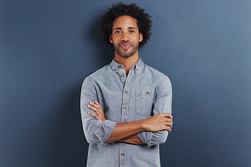 Image showing Happy man, portrait and arms crossed in studio as professional, confident and fashion by blue background. African person, face and smile for ambition as designer and creativity or pride in mock up