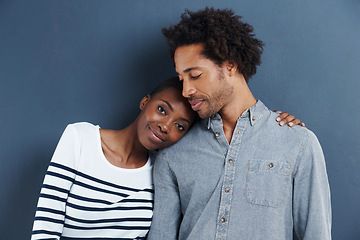 Image showing Happy, portrait and black couple hug with love on studio background together with cool fashion. African, people and smile in embrace for profile picture with casual style and clothes on mockup space