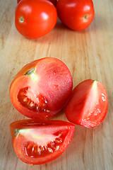 Image showing Tomatoes on a chopping board