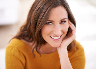 Image showing Woman, portrait and home to relax with smile for leisure, comfort and peace with happiness for wellness or wellbeing. Female person, calm and unwind for weekend break, relaxed outfit and stress free.