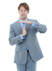 Image showing Businessman, portrait and hands with stop for no, wait or negative on a white studio background. Man or employee with disapproval sign or gesture for halt, disagreement or timeout on mockup space