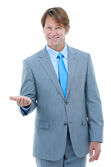 Image showing Happy, businessman and portrait with palm for advertising or marketing on a white studio background. Face of man or employee with smile or hand out for selection, choice or presentation on mockup