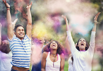 Image showing Powder, paint and friends at color festival in park, happiness and fun with celebration or party outdoor. Freedom, excited and colorful mess, smoke or dust with positivity and people at summer event