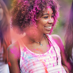 Image showing Powder, paint and happy woman at color festival in park, fun with celebration or party outdoor. Freedom, excited and colorful mess with smile for joy and culture, positivity and summer event