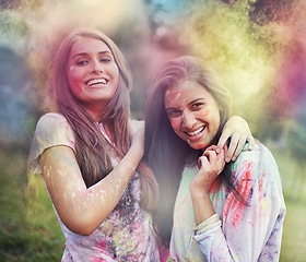 Image showing Paint, splash and portrait of women at color powder festival for fun, experience or bonding. Travel, freedom or face of lady friends in India for Holi, celebration or colorful street party tradition