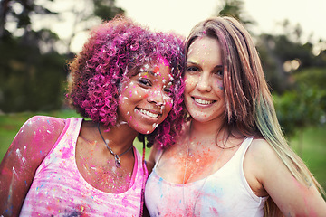Image showing Splash, paint and portrait of women at color powder festival for fun, experience or bonding. Travel, freedom or face of lady friends in India for Holi, celebration or colorful street party tradition