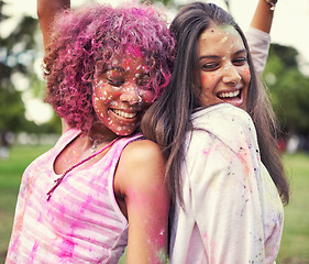 Image showing Paint, splash and women dance at color powder festival for fun, experience or bonding. Travel, freedom or excited lady friends in India for Holi, celebration or colorful street party tradition