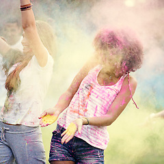 Image showing Happy, powder paint and fun with friends outdoor with Holi festival and colorful event with smile. Celebration, love and excited in nature with African people and crazy color dust for party together