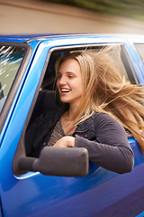 Image showing Transport, travel and woman with wind in car for adventure, journey and commute on street. Road trip, happy and excited person in vehicle for fun, driving and relax for vacation, freedom and holiday