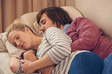 Image showing Sleeping, love and couple relax on a sofa with care, support and safety, security and bonding in their home. Peace, calm and people embrace in a living room in comfort, nap or resting in a house