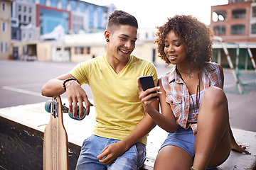 Image showing Skating, phone and couple with skateboard in city for exercise, training and sports hobby in town. Skate park, fashion and man and woman on smartphone for social media, networking and online chat