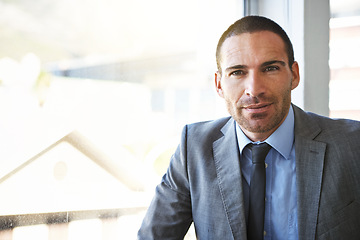 Image showing Business man, portrait and corporate professional in an office ready for work at a company window. Serious, suit and investment manager with confidence at an accounting firm with a male executive